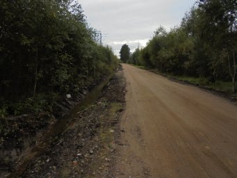 Выборочный ремонт  грунтовой дороги в пос. Новинка по улице 1-я Линия